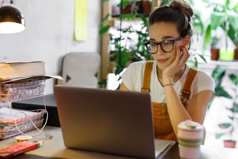 woman working remote with secure device 